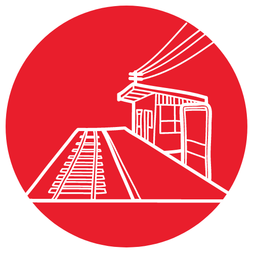 White Icon of train station in a red circle