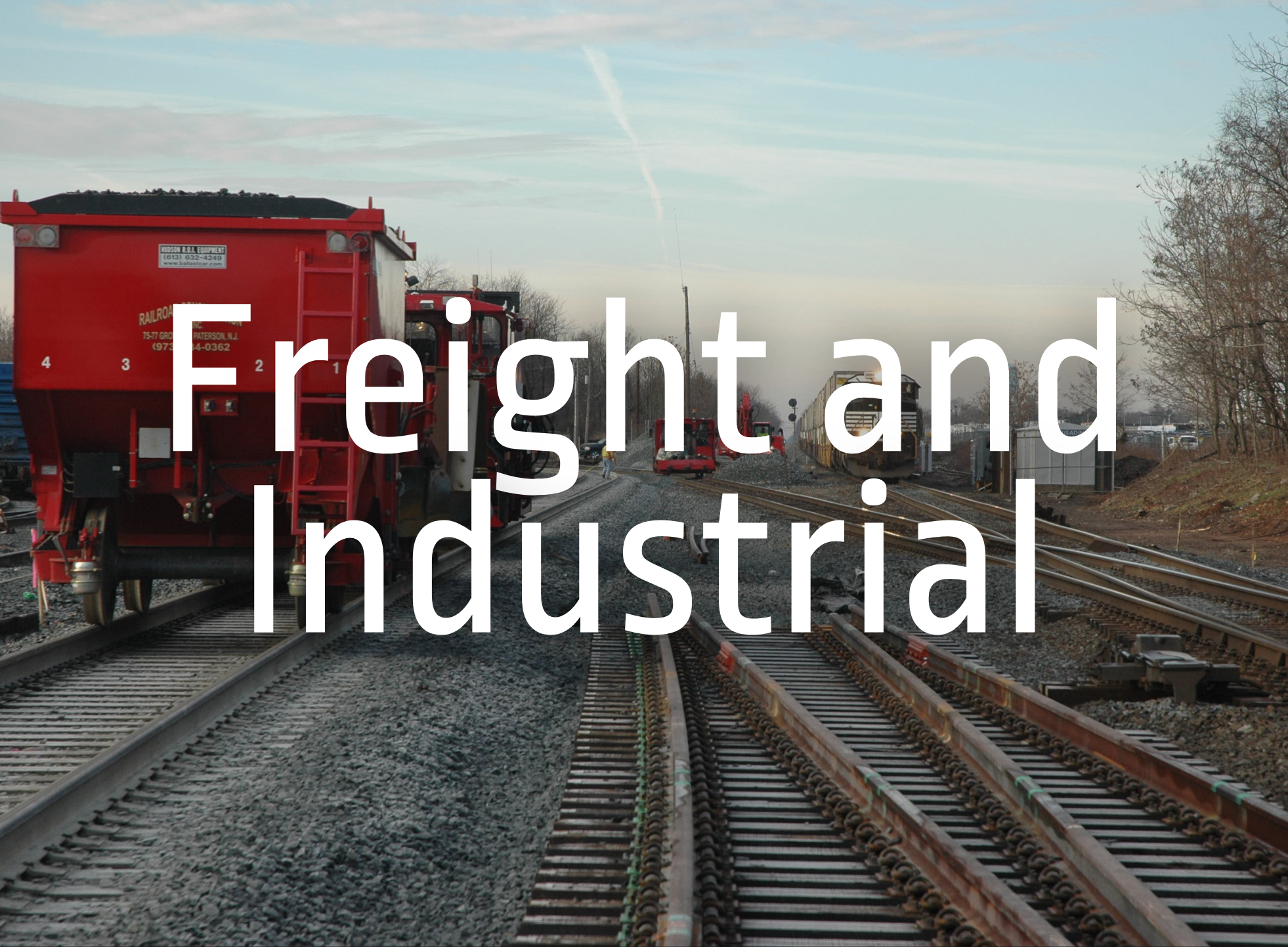 Picture of train on track holding coal/materials