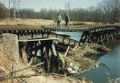Before picture of Hog Pen Railroad Bridge with men standing on bridge
